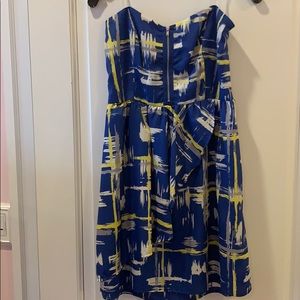 blue dress with yellow white and grey details